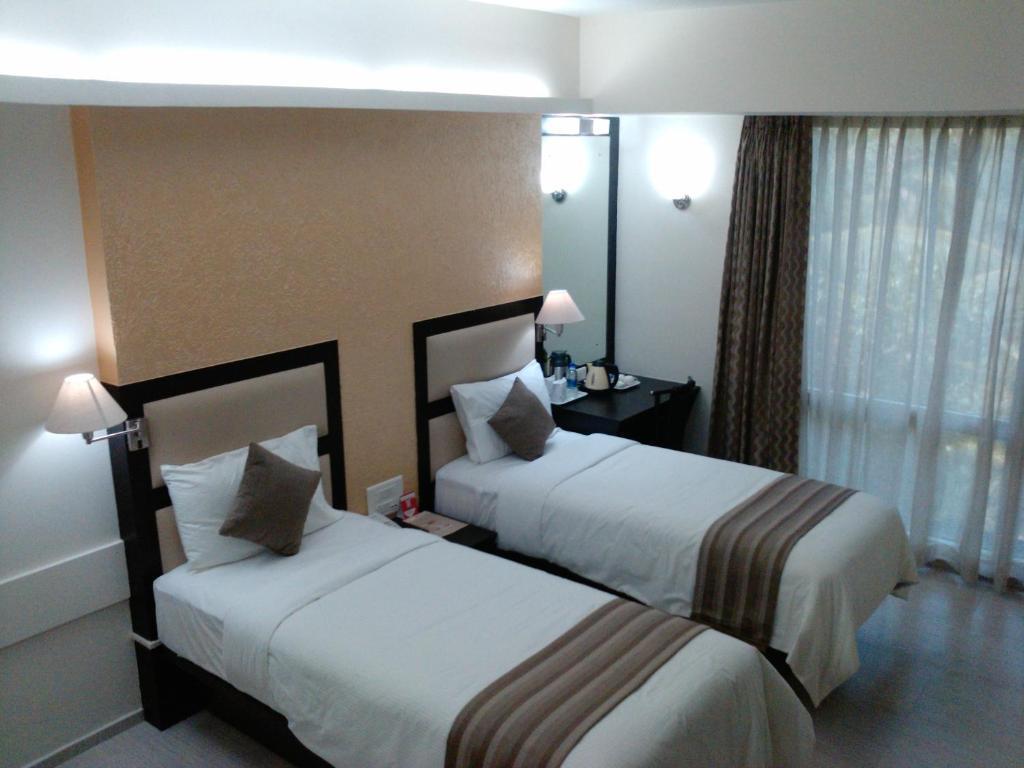 Pattom Royal Hotel Thiruvananthapuram Oda fotoğraf